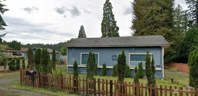 a house view with a garden space