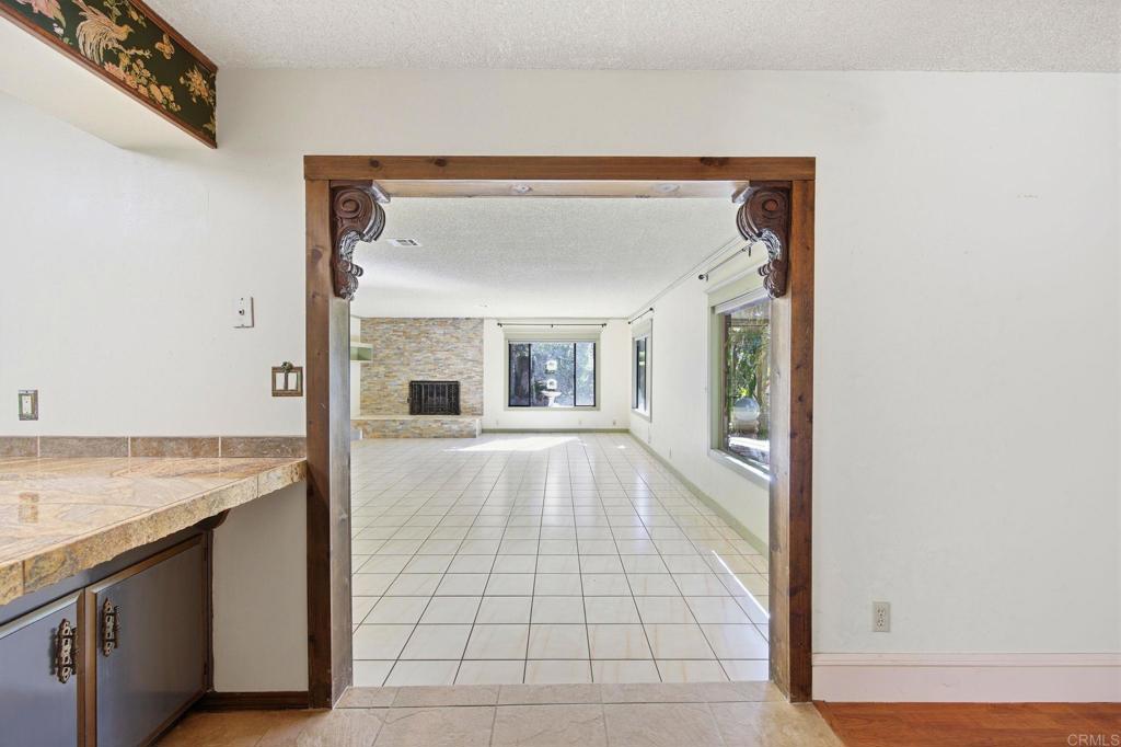 2807 South Grade Road Alpine, CA 91901 - Photo 14 of 42 a view of an empty room with kitchen and a window