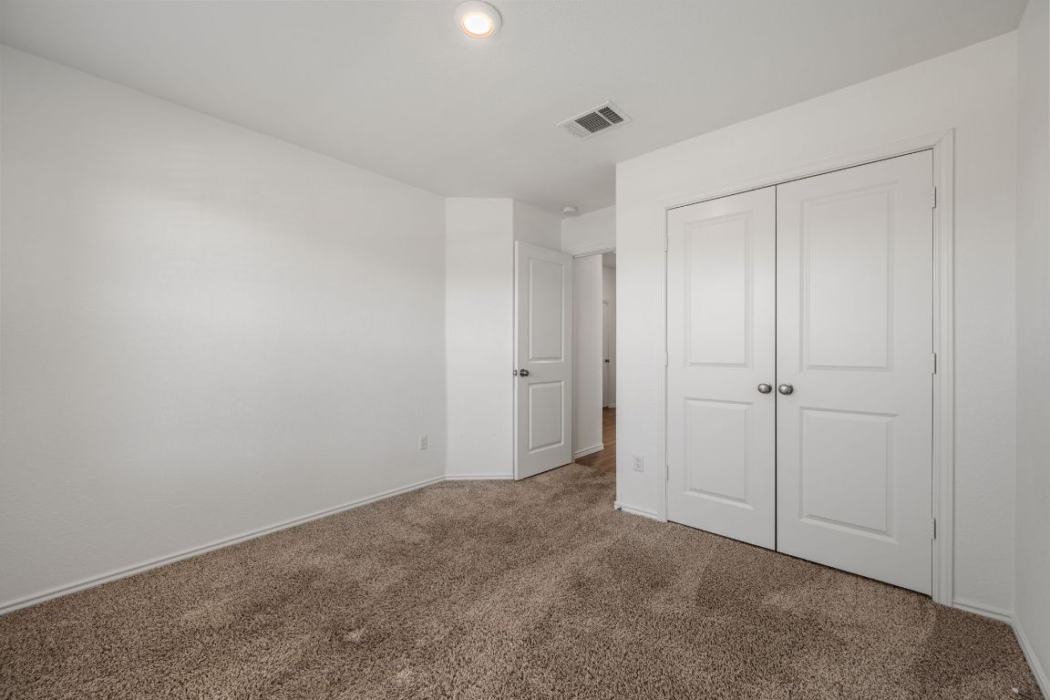 3206 Dusted Daisey Street Pflugerville, TX 78660 - Photo 16 of 25 a view of an empty room