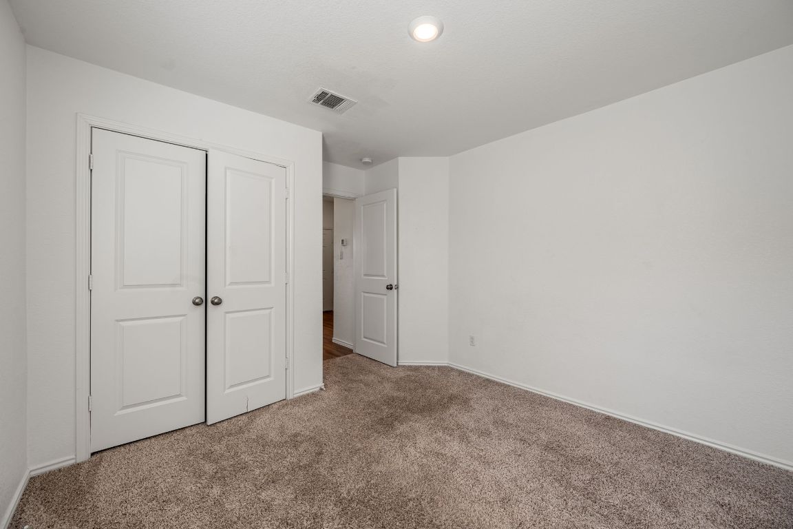 3206 Dusted Daisey Street Pflugerville, TX 78660 - Photo 19 of 25 a view of an empty room
