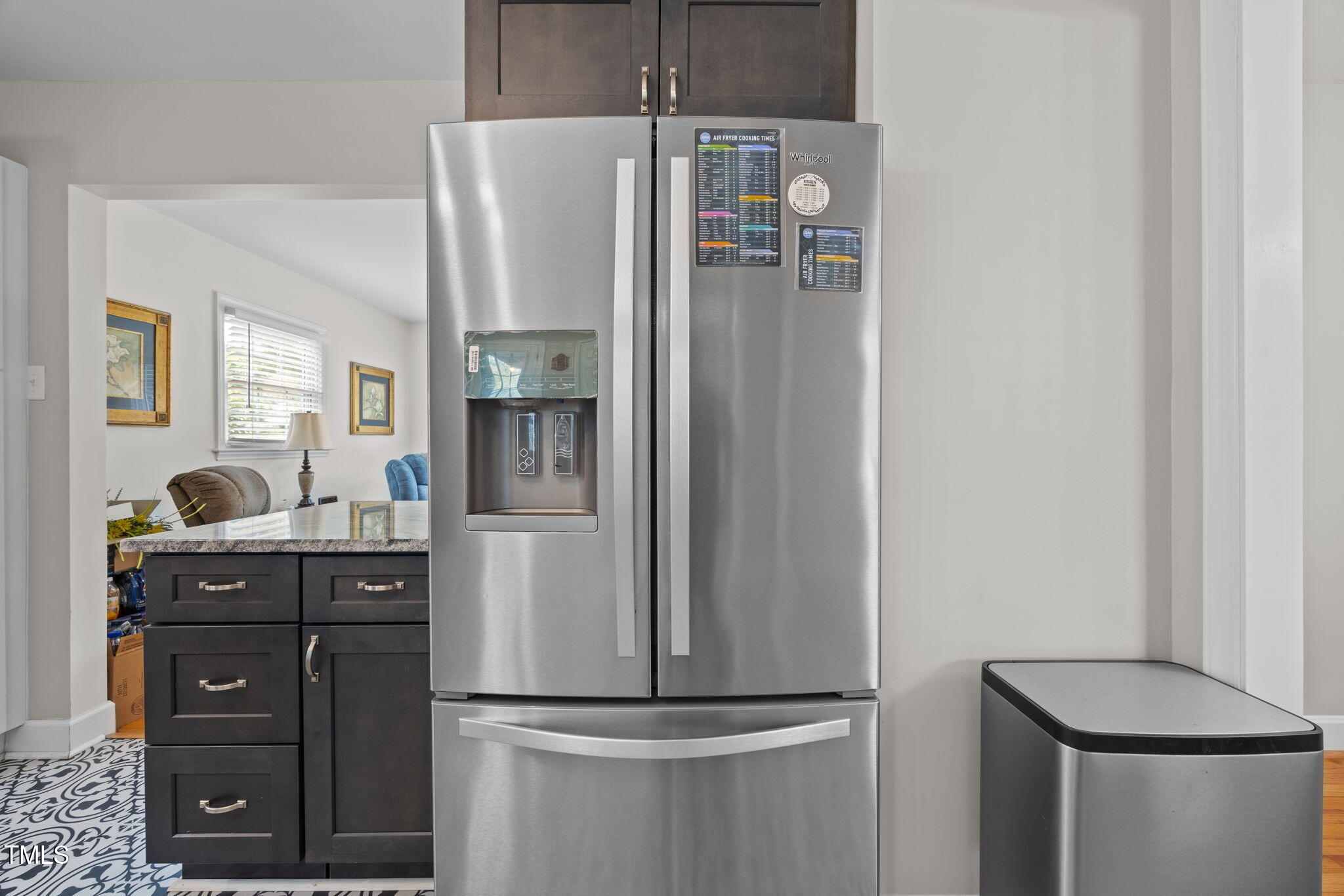 407 North 9th Street Mebane, NC 27302 - Photo 11 of 42 a kitchen with stainless steel appliances granite countertop a refrigerator and a cabinets