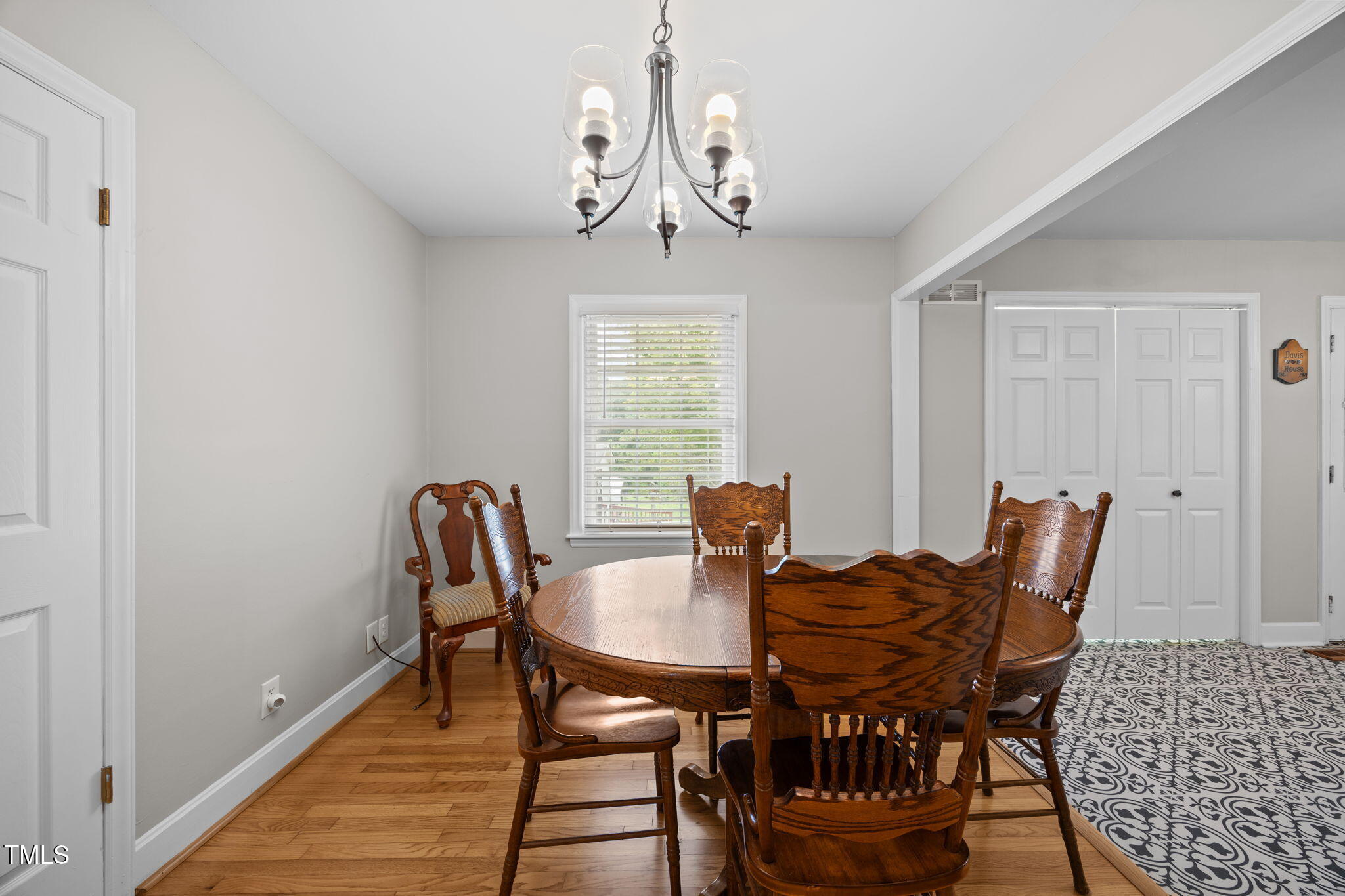 407 North 9th Street Mebane, NC 27302 - Photo 16 of 42 a view of a dining room with furniture window and wooden floor