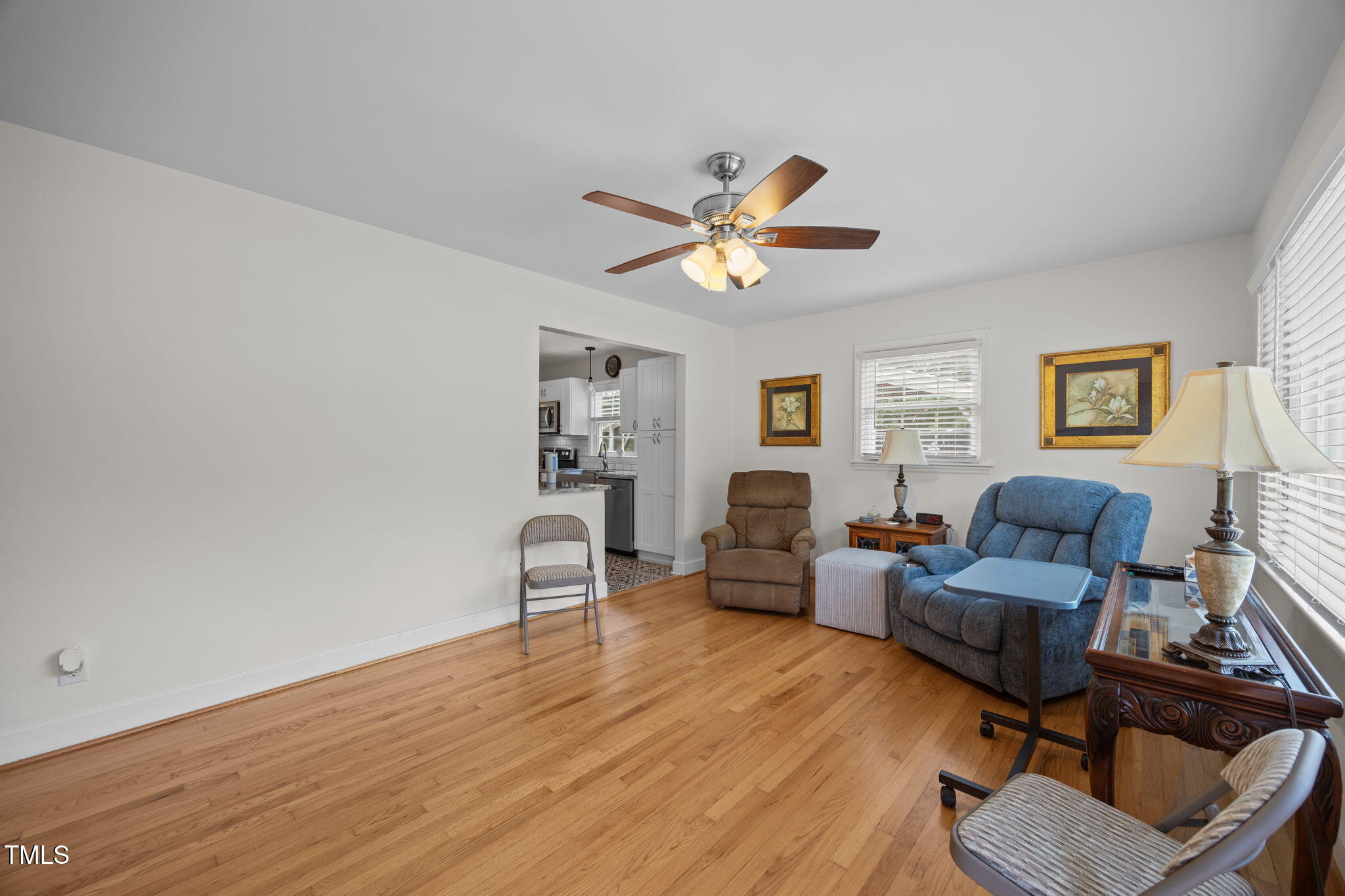 407 North 9th Street Mebane, NC 27302 - Photo 18 of 42 a living room with furniture and a wooden floor