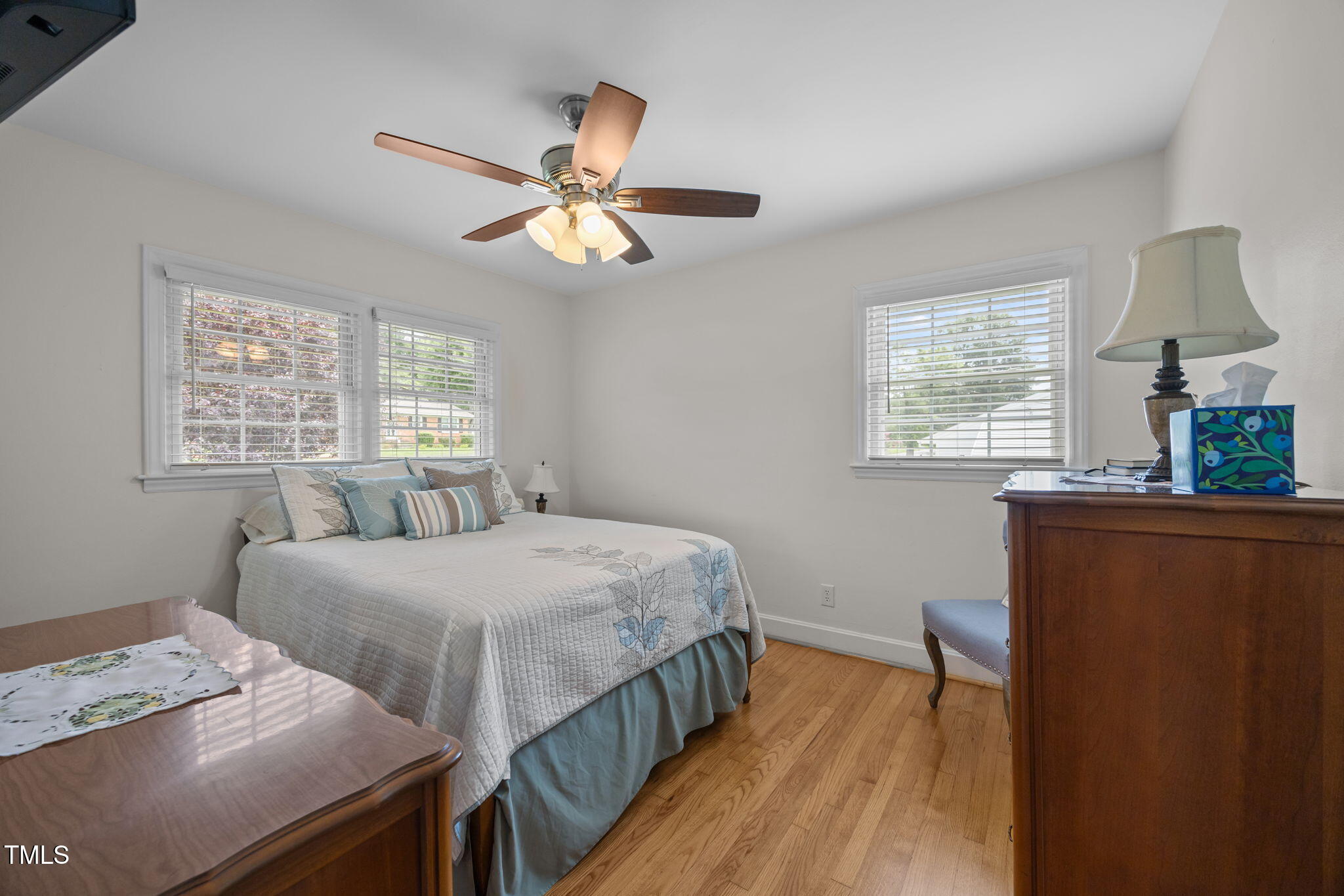 407 North 9th Street Mebane, NC 27302 - Photo 23 of 42 a bedroom with a bed and a window
