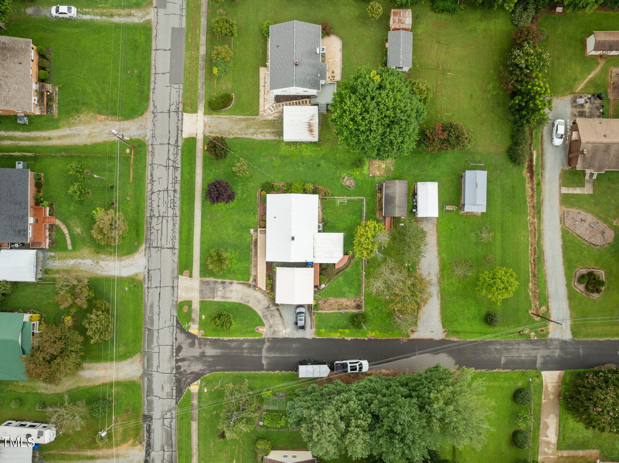 407 North 9th Street Mebane, NC 27302 - Photo 32 of 42 an aerial view of a house with a garden