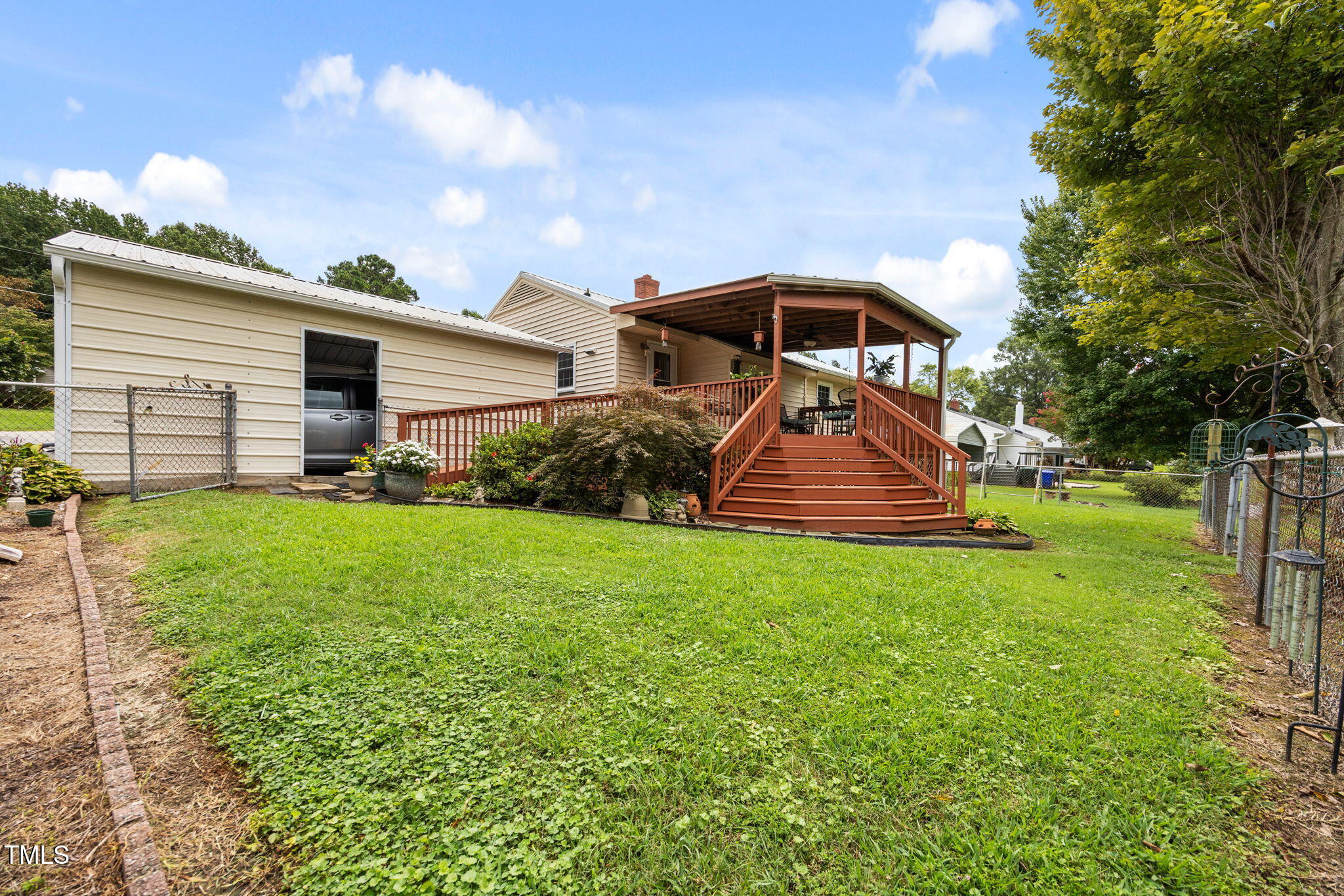 407 North 9th Street Mebane, NC 27302 - Photo 34 of 42 a front view of a house with garden