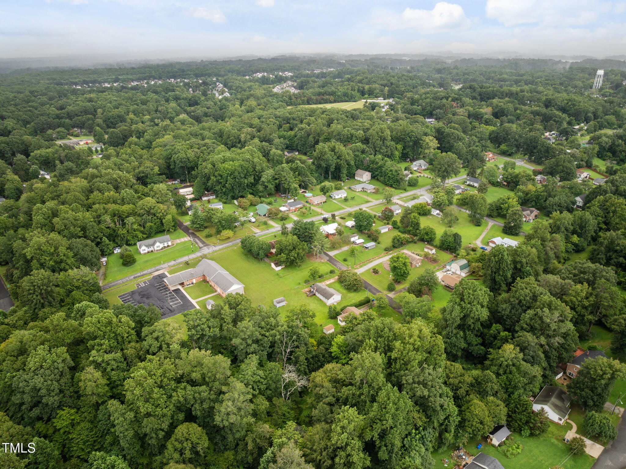 407 North 9th Street Mebane, NC 27302 - Photo 41 of 42 an aerial view of a houses with a yard