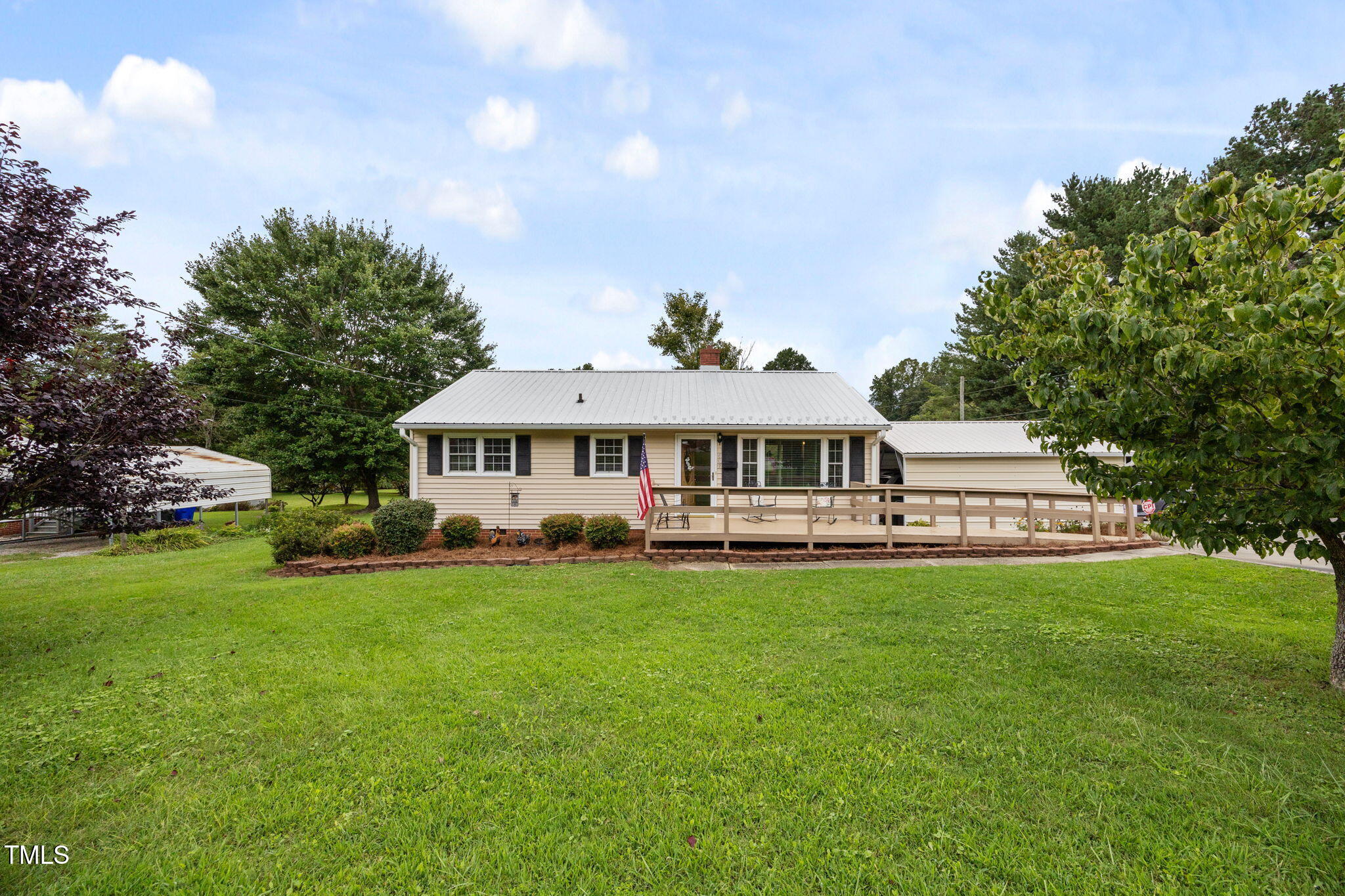 407 North 9th Street Mebane, NC 27302 - Photo 42 of 42 a front view of a house with garden