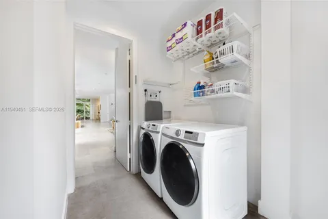 a view of washer and dryer in a utility room
