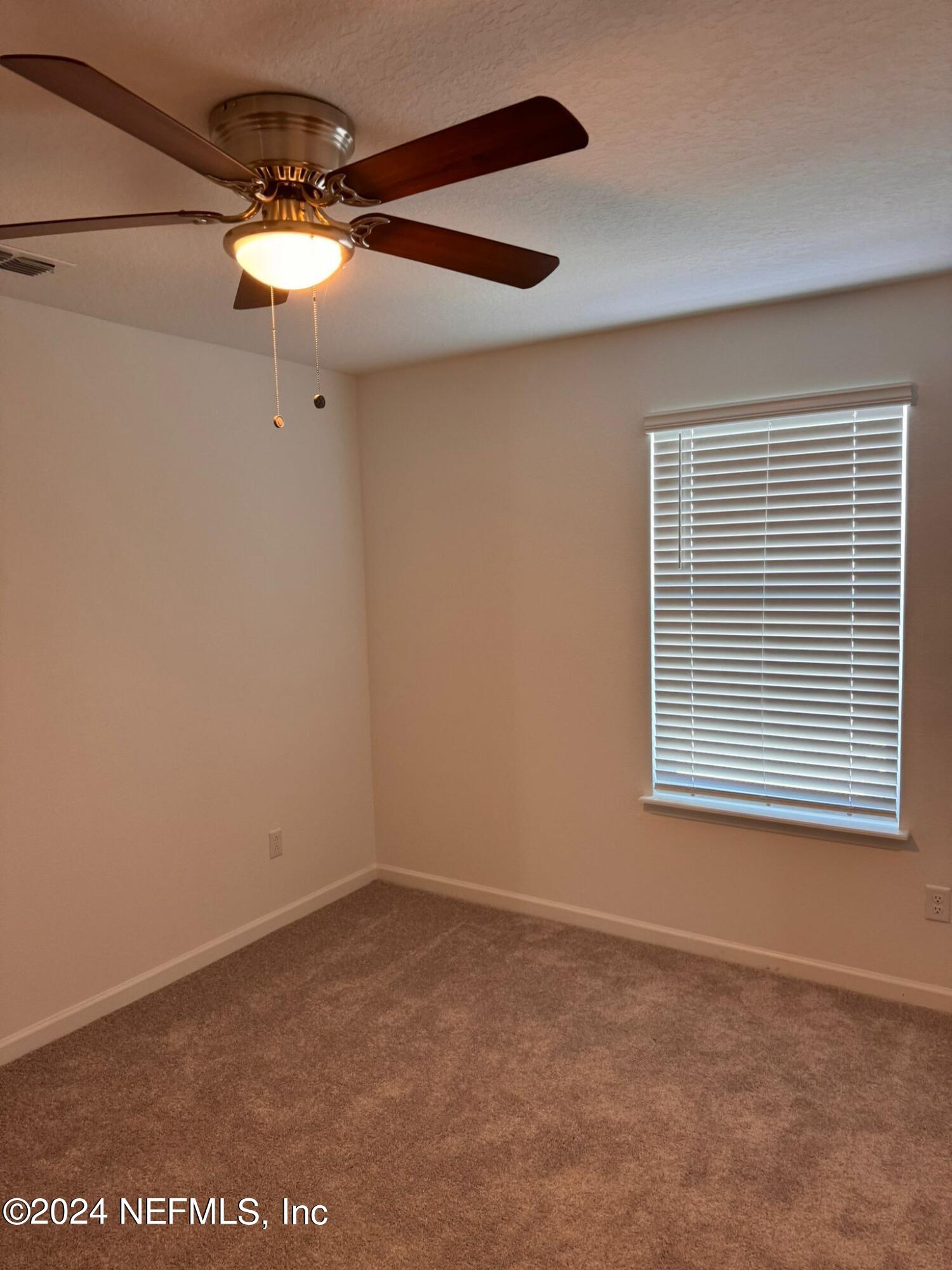362 Belfort Court St. Augustine, FL 32092 - Photo 15 of 29 a view of an empty room with a window