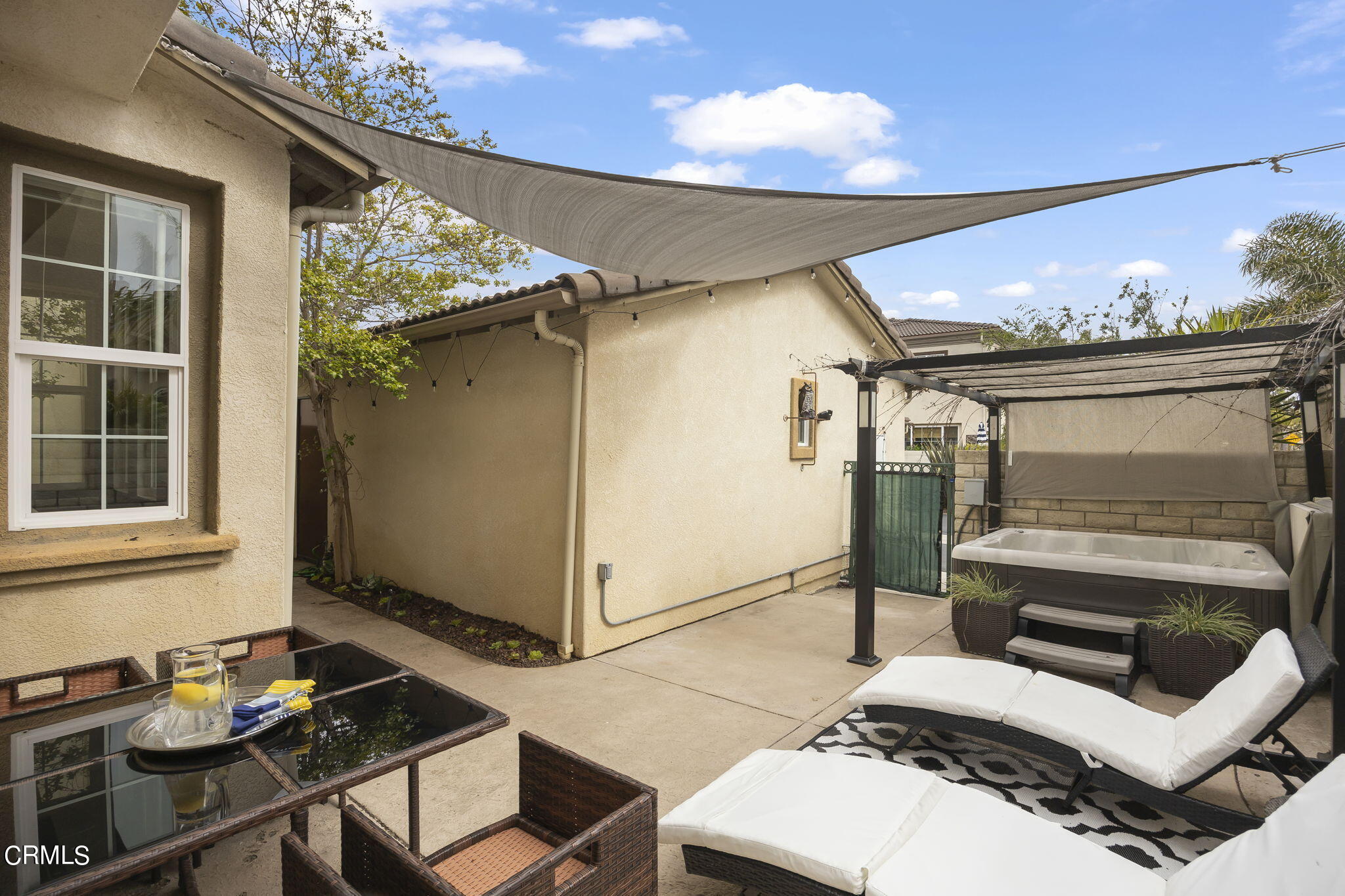 4352 Waterside Lane Oxnard, CA 93035 - Photo 23 of 37 Yard with hot tub and patio