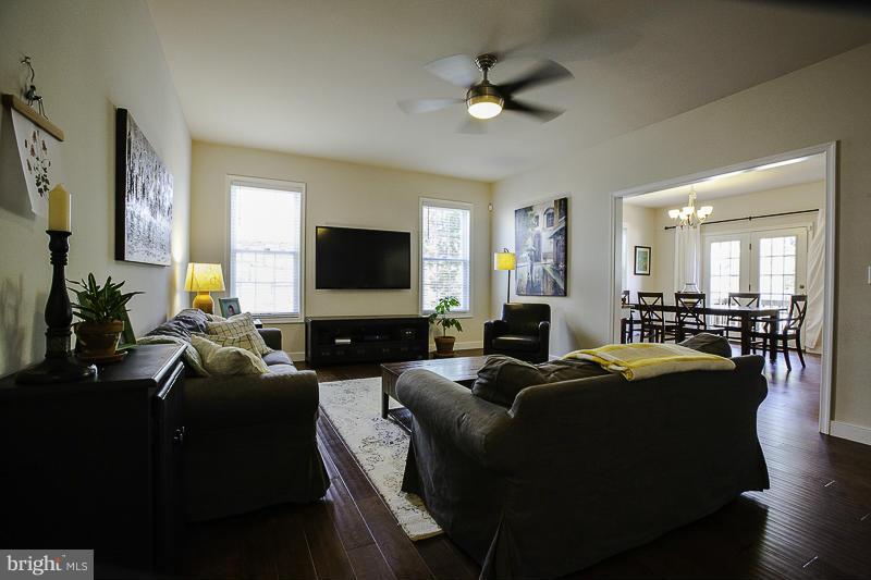 803 Sunken Road Fredericksburg, VA 22401 - Photo 2 of 23 a living room with furniture and a flat screen tv
