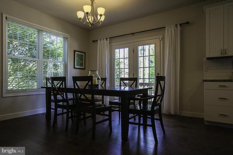 803 Sunken Road Fredericksburg, VA 22401 - Photo 4 of 23 a view of a dining room with furniture window and wooden floor