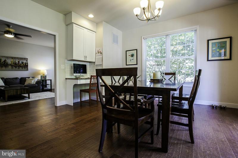 803 Sunken Road Fredericksburg, VA 22401 - Photo 5 of 23 a view of a dining room with furniture window and wooden floor