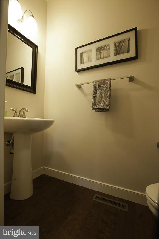 803 Sunken Road Fredericksburg, VA 22401 - Photo 10 of 23 a bathroom with a sink and mirror