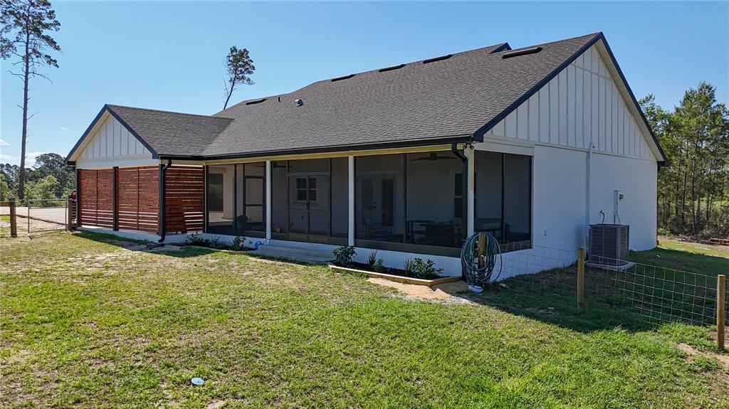 7890 Southwest 129th Avenue Cedar Key, FL 32625 - Photo 36 of 45 a view of a house with backyard and garden
