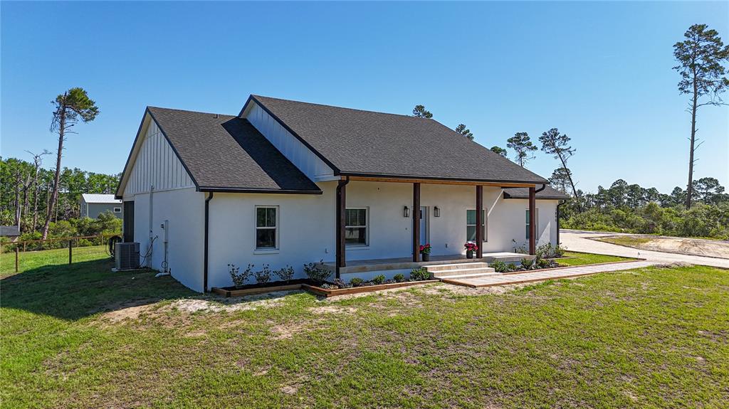 7890 Southwest 129th Avenue Cedar Key, FL 32625 - Photo 42 of 45 a house view with a garden space