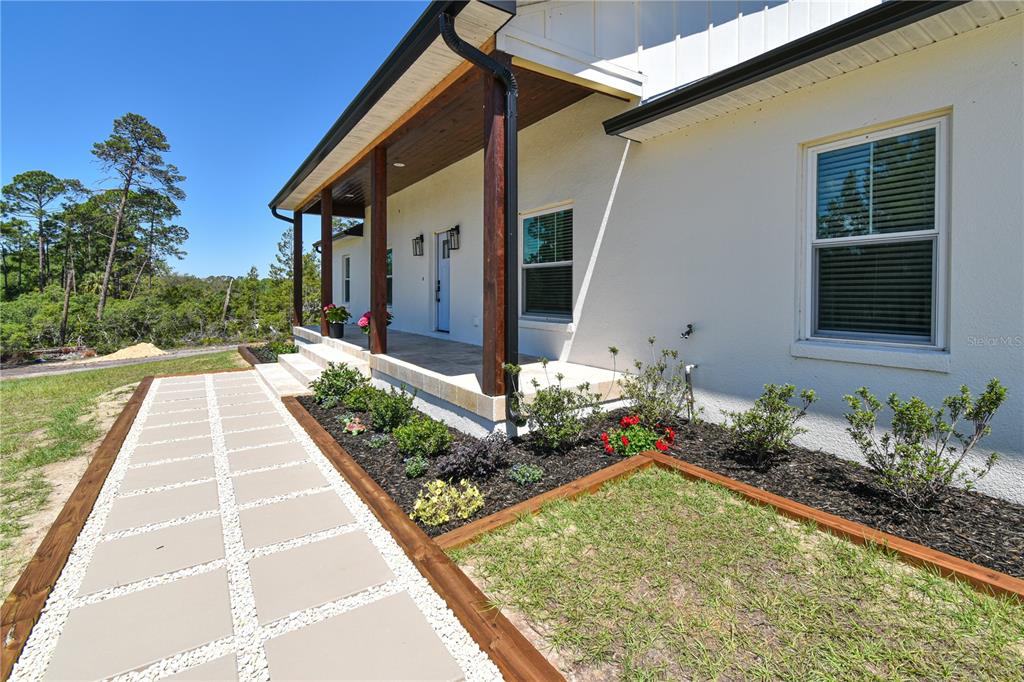 7890 Southwest 129th Avenue Cedar Key, FL 32625 - Photo 5 of 45 a view of a house with a yard