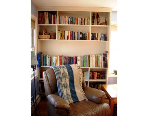 10 Scott Road Harvard, MA 01451 - Photo 6 of 13 a living room with a couch and a book shelf