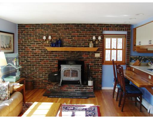 10 Scott Road Harvard, MA 01451 - Photo 7 of 13 a view of a livingroom with furniture and a fireplace