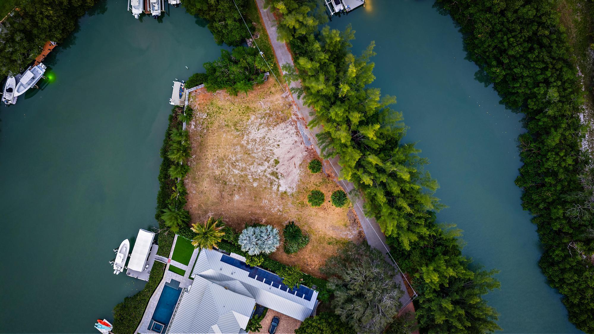 an aerial view of a house with outdoor space