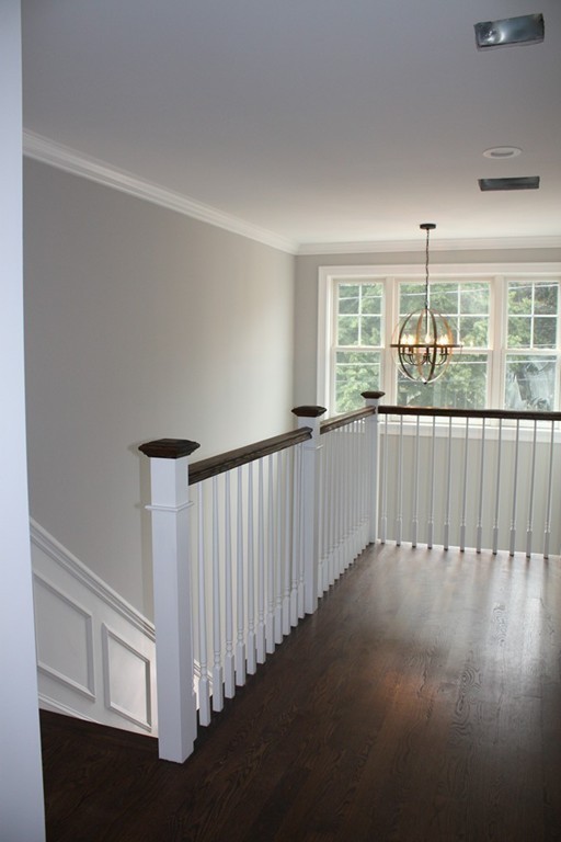 67 Evelyn Road Needham, MA 02494 - Photo 12 of 13 a view of a room with wooden floor and windows
