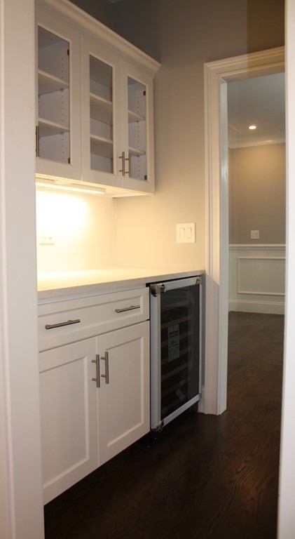 67 Evelyn Road Needham, MA 02494 - Photo 4 of 13 a view of a kitchen with a sink
