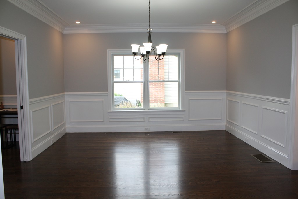 67 Evelyn Road Needham, MA 02494 - Photo 5 of 13 a view of an empty room with wooden floor and a window
