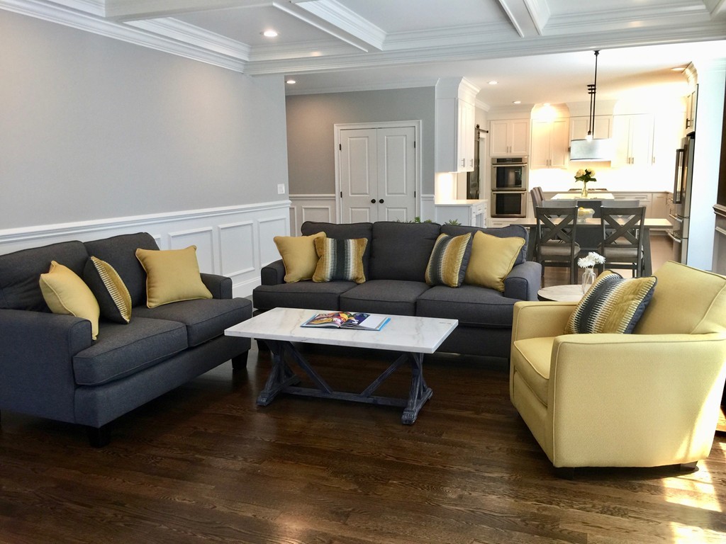 67 Evelyn Road Needham, MA 02494 - Photo 7 of 13 a living room with furniture wooden floor and a large window