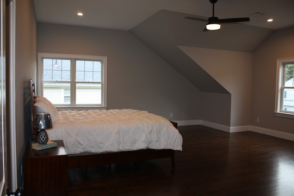67 Evelyn Road Needham, MA 02494 - Photo 9 of 13 a bedroom with a bed and a window