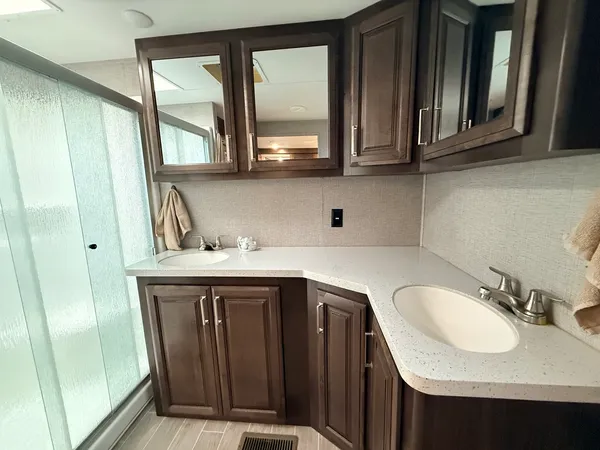 a bathroom with a sink and a mirror