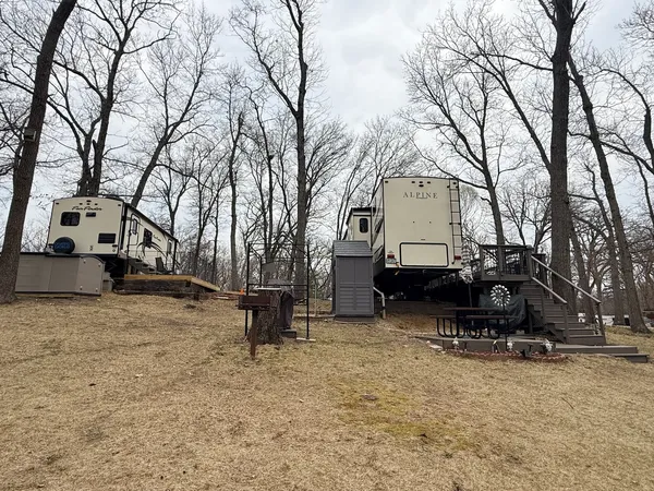 a view of a house with a snow in a yard