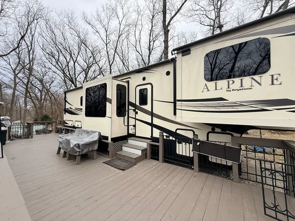 a view of a street with cars