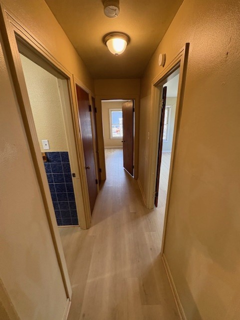 503 Marie Place Beeville, TX 78102 - Photo 12 of 30 a view of a hallway with wooden floor