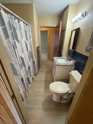 a large spacious bathroom with a large tub and sink