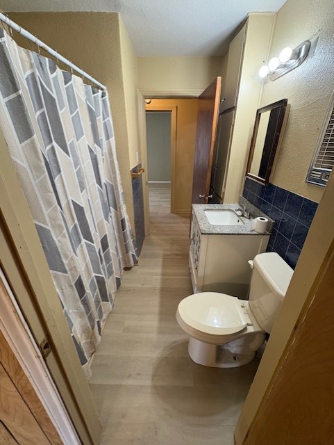 503 Marie Place Beeville, TX 78102 - Photo 18 of 30 a bathroom with a toilet and a shower