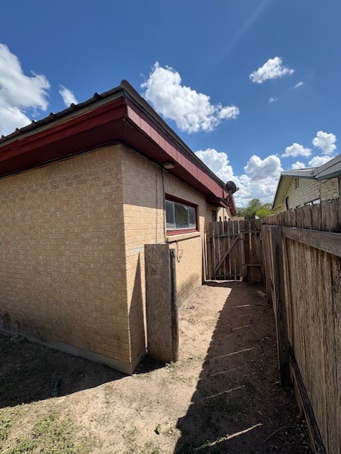 503 Marie Place Beeville, TX 78102 - Photo 5 of 30 a view of a house with a backyard