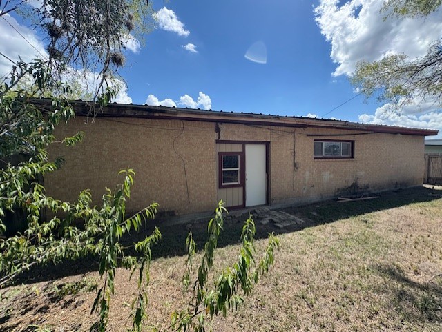 503 Marie Place Beeville, TX 78102 - Photo 8 of 30 a front view of a house with a yard