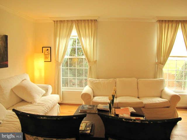 10277 Gainsborough Road Potomac, MD 20854 - Photo 5 of 14 a living room with furniture and a window
