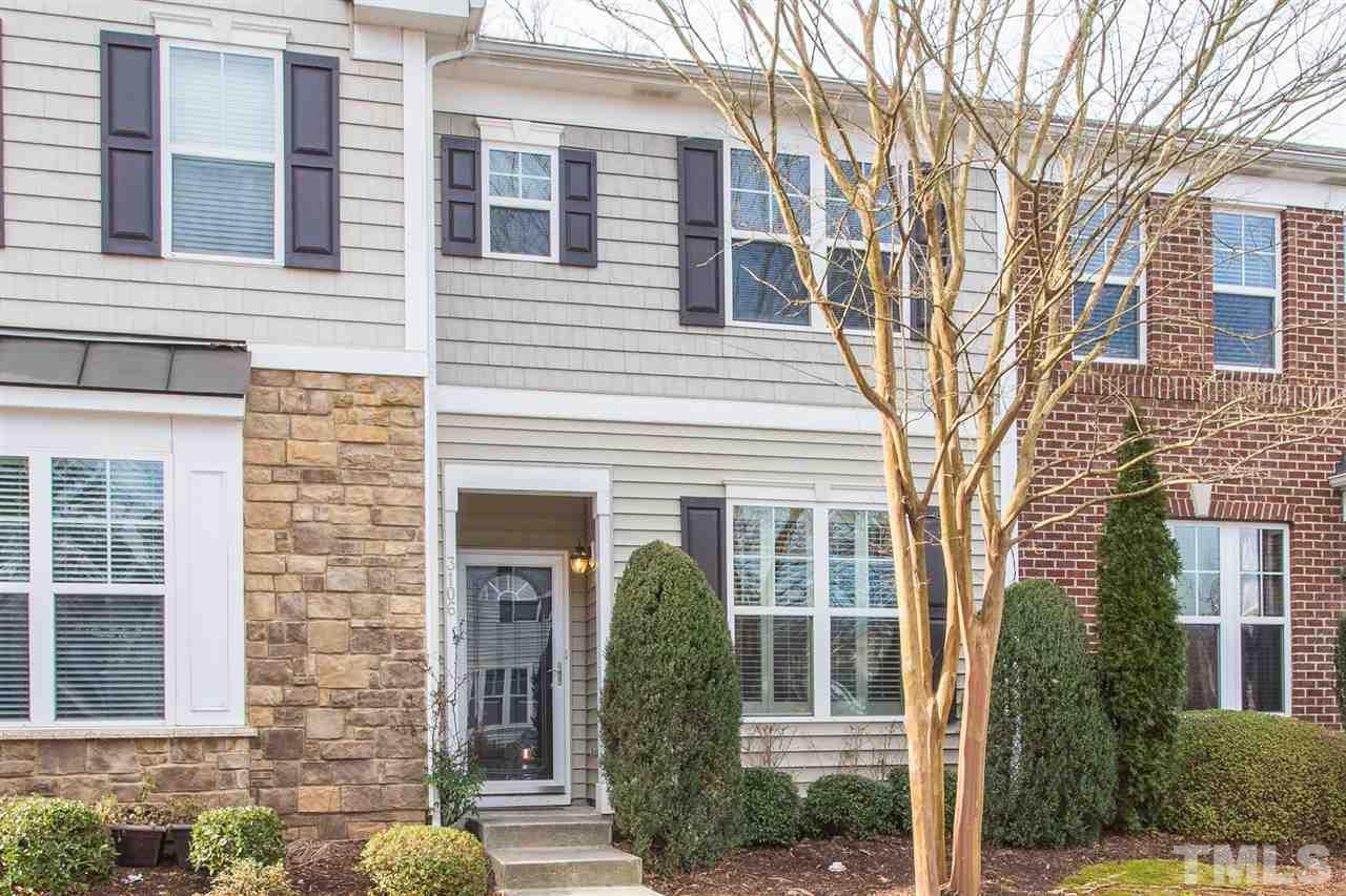 3106 Berkeley Springs Place Raleigh, NC 27616 - Photo 2 of 26 a view of a brick house with large windows