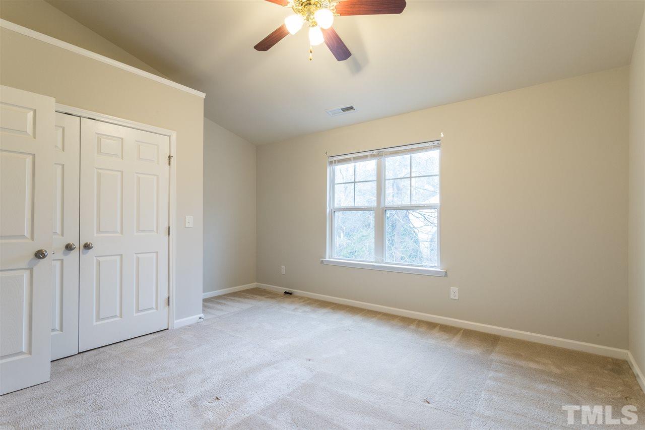 3106 Berkeley Springs Place Raleigh, NC 27616 - Photo 17 of 26 an empty room with a window