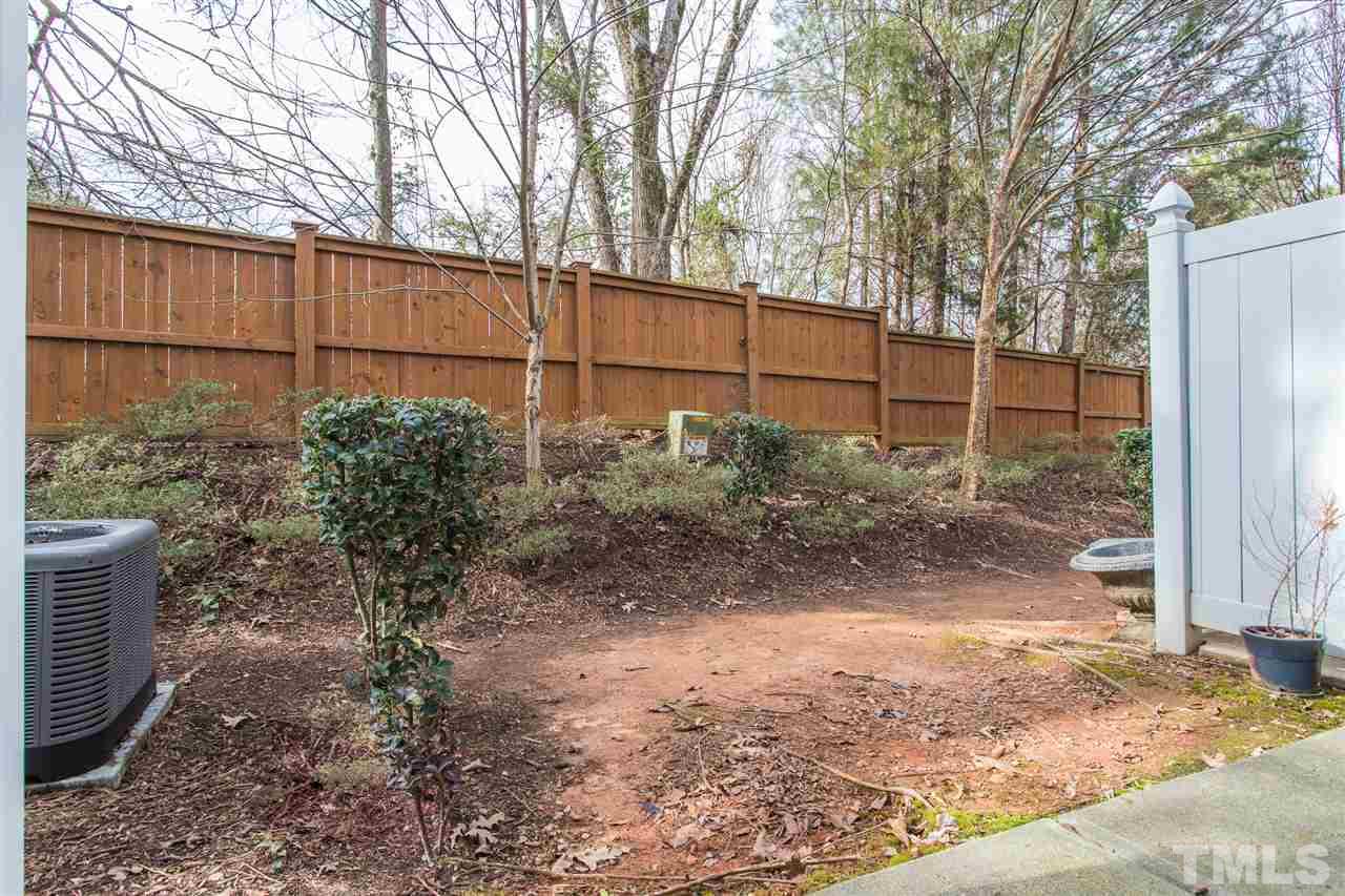 3106 Berkeley Springs Place Raleigh, NC 27616 - Photo 24 of 26 a backyard of a house