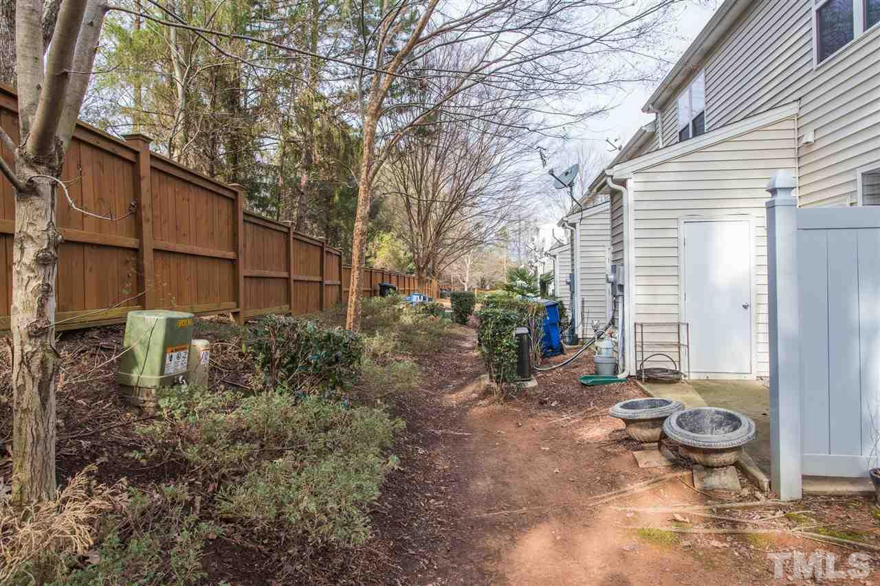 3106 Berkeley Springs Place Raleigh, NC 27616 - Photo 25 of 26 a view of a back yard of the house