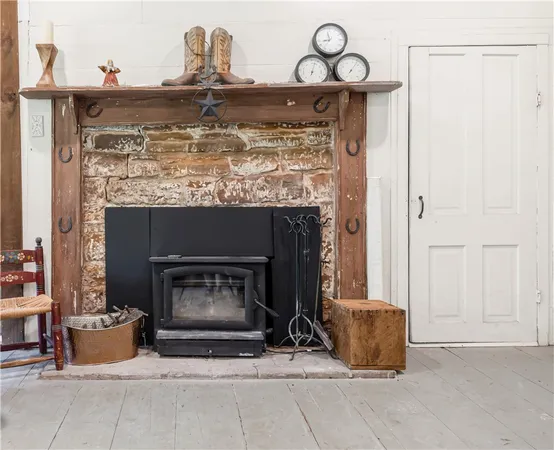 a fireplace with a clock on top of it