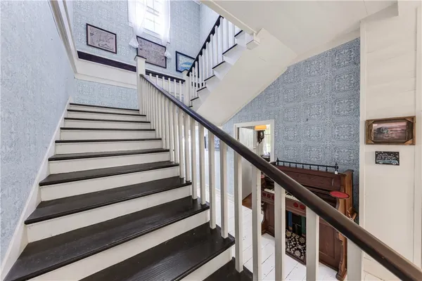 a view of entryway with wooden floor