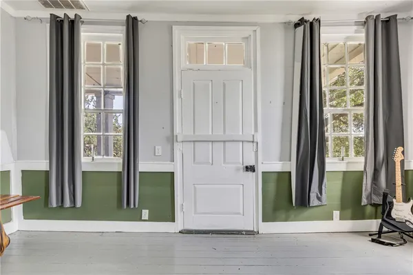 a view of staircase with white walls and white walls