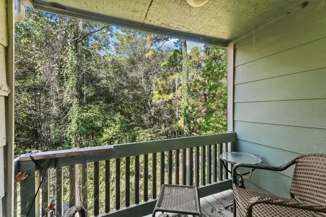 a view of a chair in a balcony