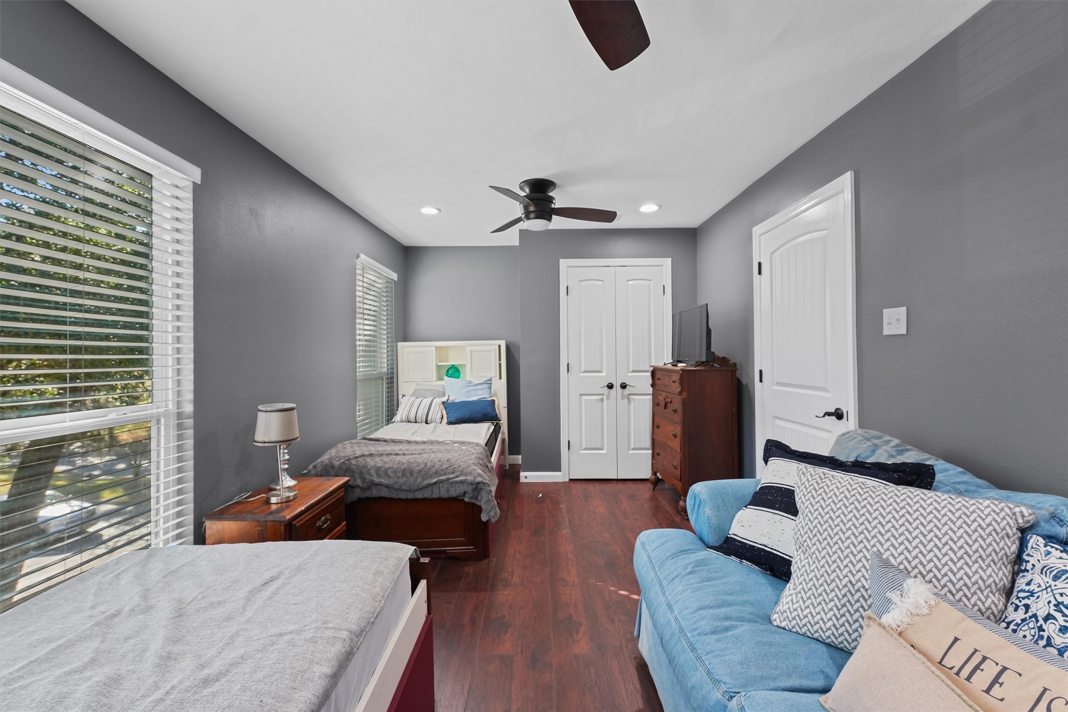 102 Villa Way Coldspring, TX 77331 - Photo 19 of 34 a bedroom with furniture and a window