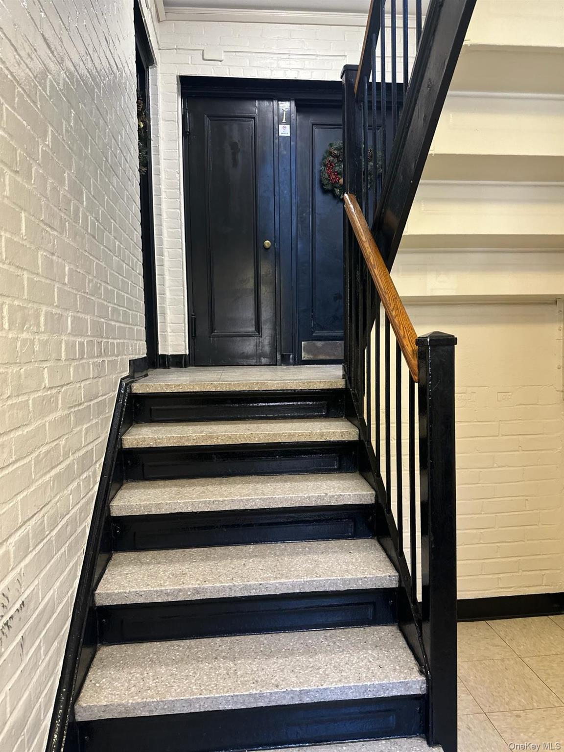 22-28 77th Street, Unit C1 Queens, NY 11370 - Photo 2 of 7 a view of entryway