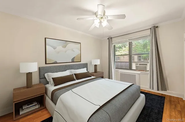 a bedroom with a large bed and a window